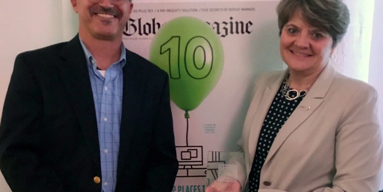 Gary Pease And Lisa Brothers Hold Award
