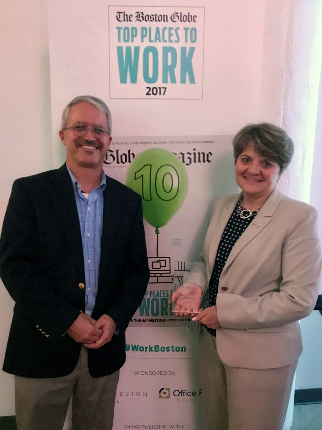 Gary Pease And Lisa Brothers Hold Award
