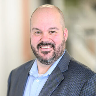 Headshot of Thomas Lyons