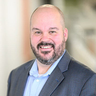 Headshot of Thomas Lyons